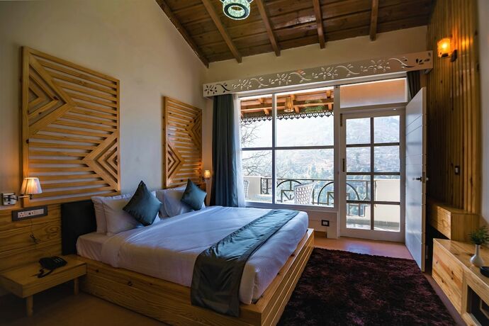 Imagen de la habitación del Hotel Clarks Exotica Ramgarh. Foto 19