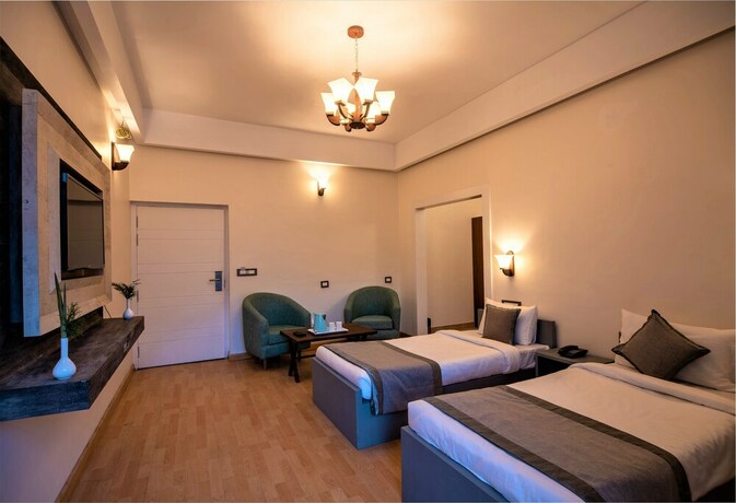 Imagen de la habitación del Hotel Clarks Exotica Ramgarh. Foto 20