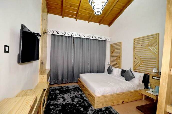 Imagen de la habitación del Hotel Clarks Exotica Ramgarh. Foto 22