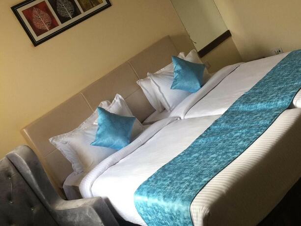 Imagen de la habitación del Hotel Clarks Inn Dudhwa. Foto 20