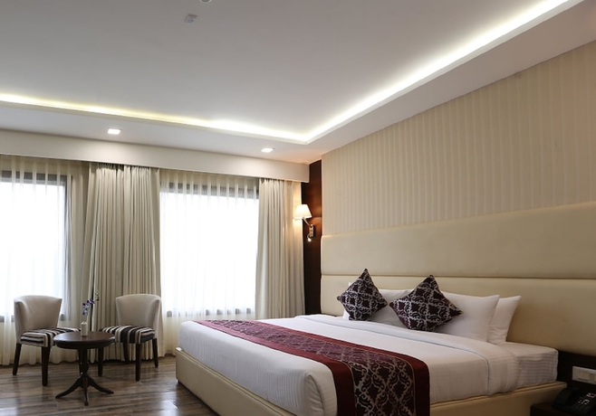 Imagen de la habitación del Hotel Clarks Inn Suite Gwalior. Foto 4