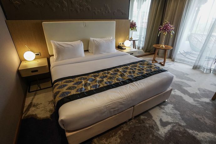 Imagen de la habitación del Hotel Clarks Inn suites Raipur. Foto 8