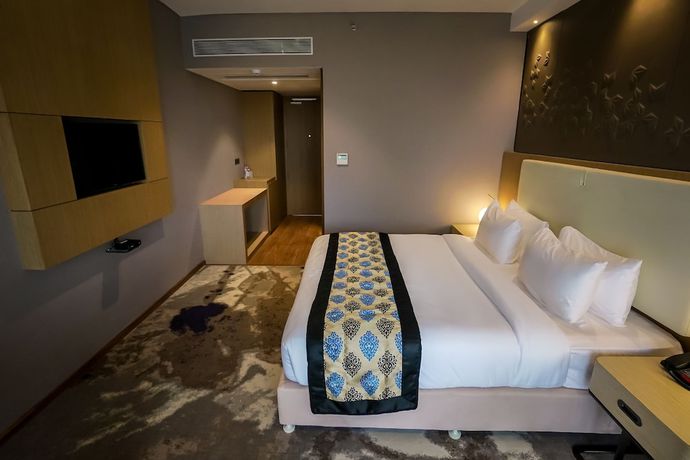 Imagen de la habitación del Hotel Clarks Inn suites Raipur. Foto 9