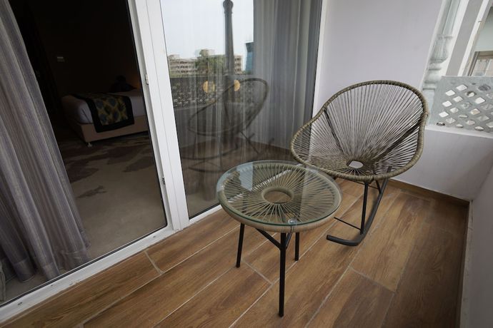 Imagen de la habitación del Hotel Clarks Inn suites Raipur. Foto 11