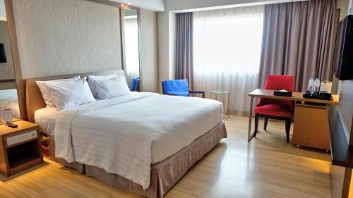 Imagen de la habitación del Hotel Claro Makassar. Foto 6