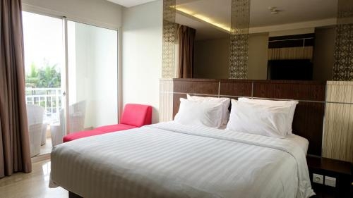 Imagen de la habitación del Hotel Claro Makassar. Foto 8