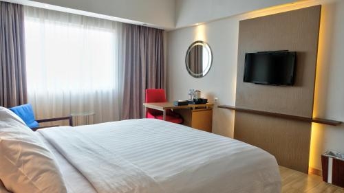 Imagen de la habitación del Hotel Claro Makassar. Foto 10