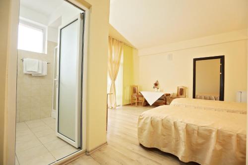 Imagen de la habitación del Hotel Class, Oradea. Foto 8