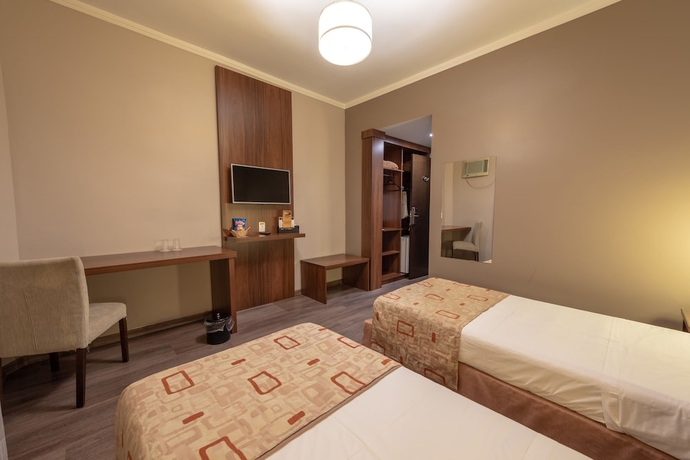 Imagen de la habitación del Hotel Class Varginha. Foto 7