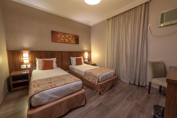Imagen de la habitación del Hotel Class Varginha. Foto 8