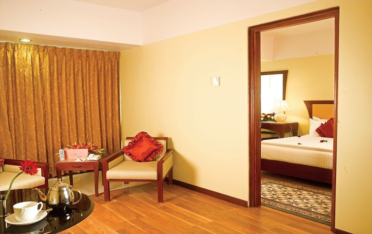 Imagen de la habitación del Hotel Classic Sarovar Portico Trivandrum. Foto 5