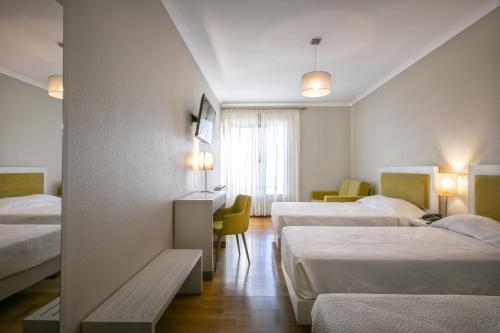 Imagen de la habitación del Hotel Classico. Foto 7