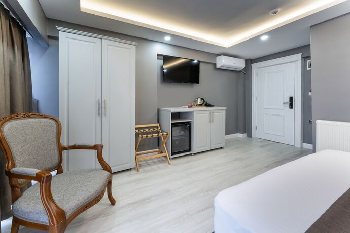Imagen de la habitación del Hotel Classio Suite. Foto 9