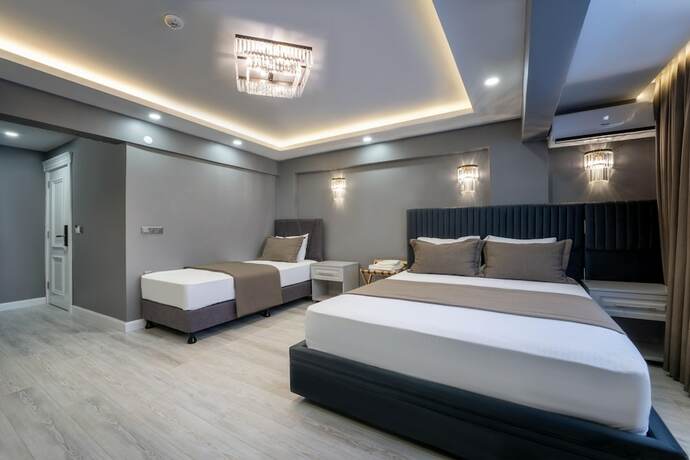 Imagen de la habitación del Hotel Classio Suite. Foto 12