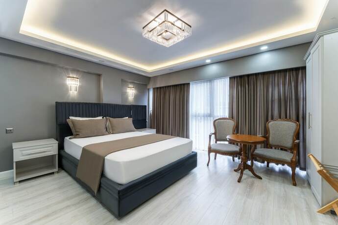 Imagen de la habitación del Hotel Classio Suite. Foto 13