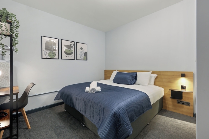 Imagen de la habitación del Hotel Clayton Apartments. Foto 11