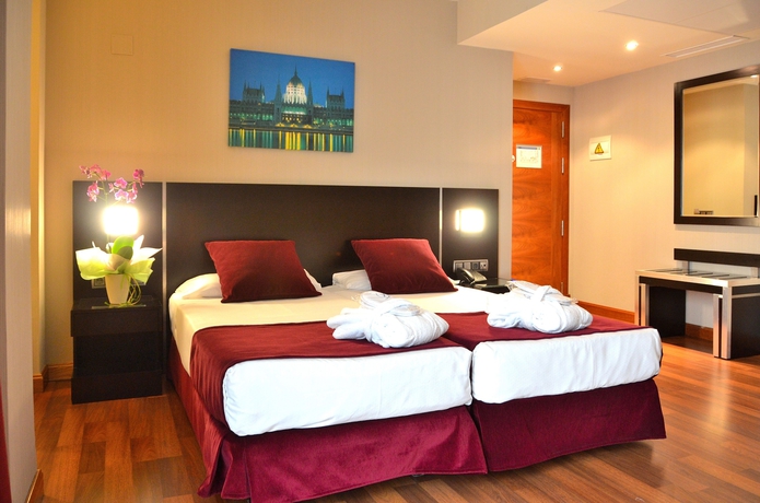 Imagen de la habitación del Hotel Clement Barajas. Foto 12