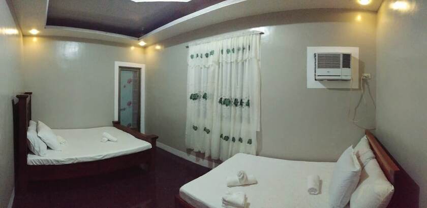 Imagen de la habitación del Hotel Clemente's Garden and Resort. Foto 8