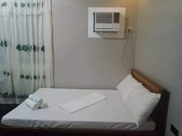 Imagen de la habitación del Hotel Clemente's Garden and Resort. Foto 9