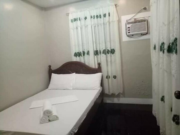 Imagen de la habitación del Hotel Clemente's Garden and Resort. Foto 10