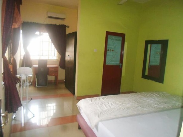 Imagen de la habitación del Hotel Clen Phils and Suites. Foto 8
