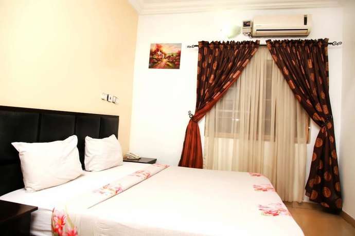 Imagen de la habitación del Hotel Clen Phils and Suites. Foto 15