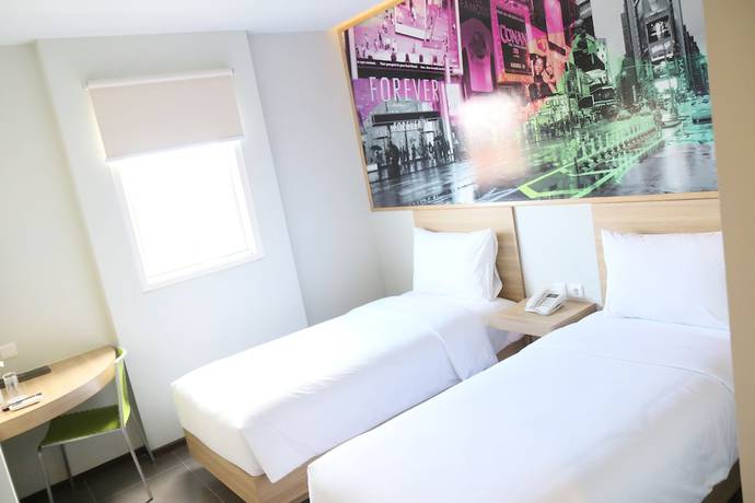 Imagen de la habitación del Hotel Cleo Jemursari. Foto 5