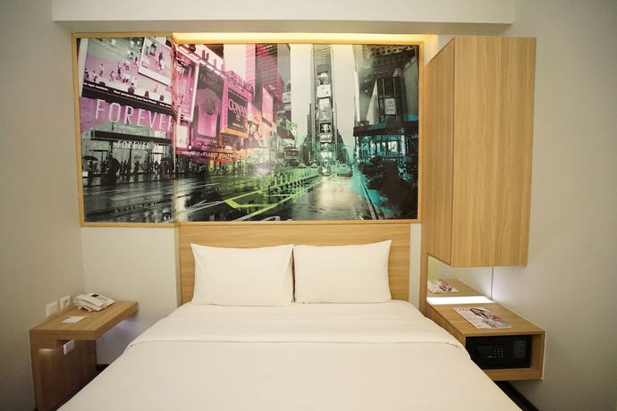 Imagen de la habitación del Hotel Cleo Jemursari. Foto 8