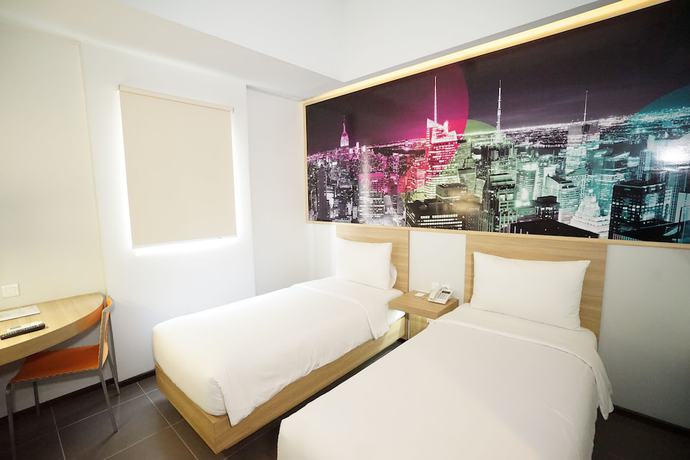 Imagen de la habitación del Hotel Cleo Jemursari. Foto 9