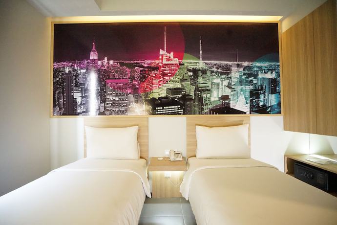 Imagen de la habitación del Hotel Cleo Jemursari. Foto 10