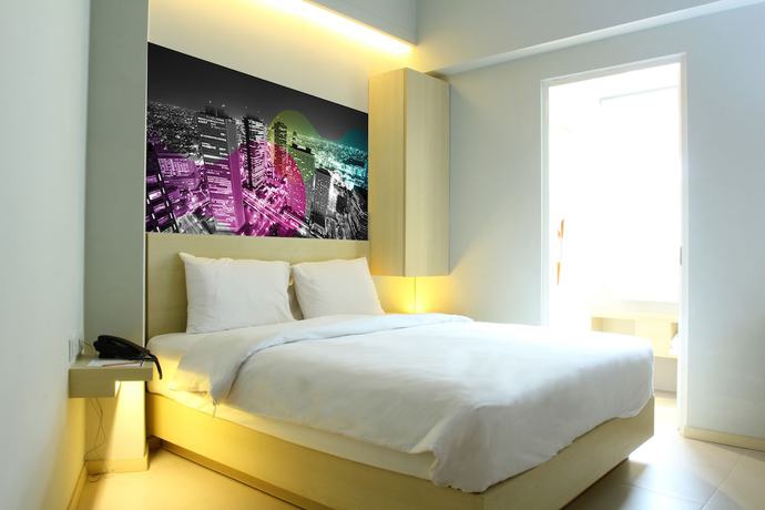 Imagen de la habitación del Hotel Cleo Jemursari. Foto 11