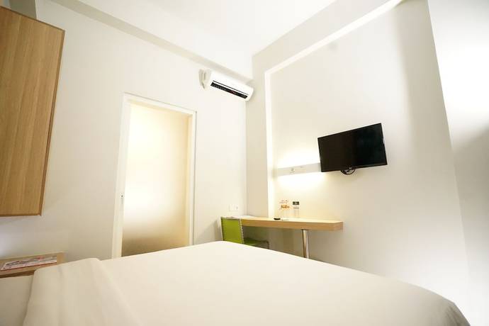 Imagen de la habitación del Hotel Cleo Jemursari. Foto 13