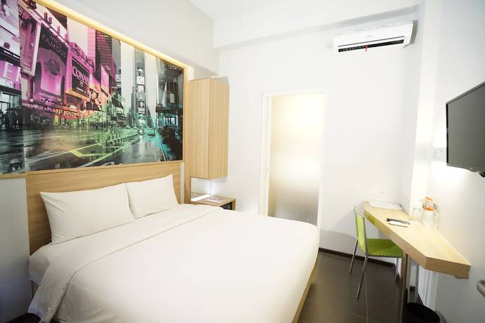 Imagen de la habitación del Hotel Cleo Jemursari. Foto 14