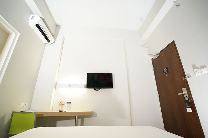 Imagen de la habitación del Hotel Cleo Jemursari. Foto 16