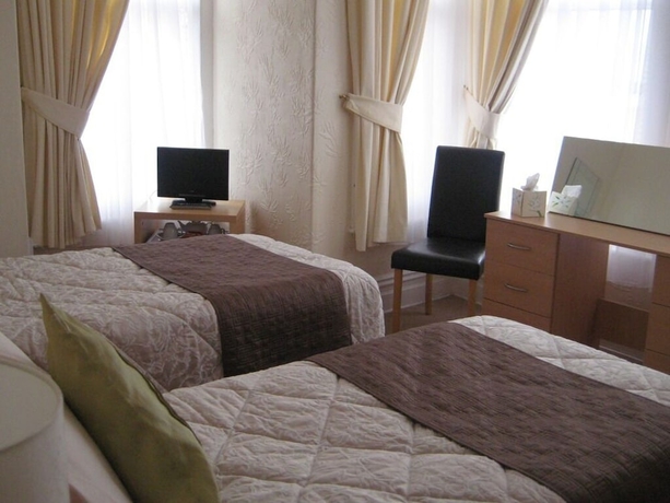 Imagen de la habitación del Hotel Cleve Court. Foto 11