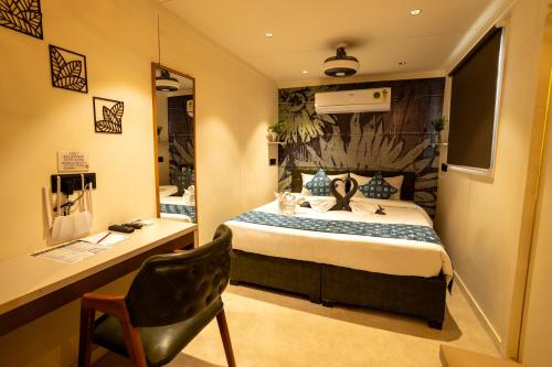 Imagen de la habitación del Hotel Click Mundra. Foto 17
