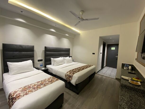 Imagen de la habitación del Hotel Click Sunburry Katra. Foto 10