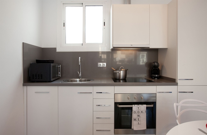 Imagen de la habitación del Hotel Click and Flat Seneca Suites. Foto 3