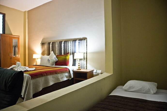 Imagen de la habitación del Hotel Cliff Haven Beach Resort. Foto 16