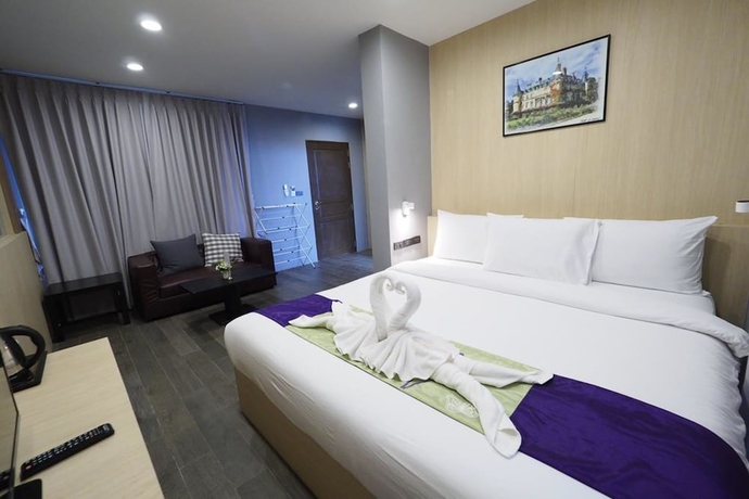 Imagen de la habitación del Hotel Cliff Lanta Suite. Foto 9
