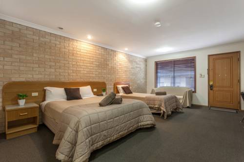 Imagen de la habitación del Hotel Clifford Gardens Motor Inn. Foto 2