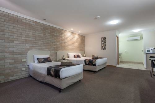 Imagen de la habitación del Hotel Clifford Gardens Motor Inn. Foto 4