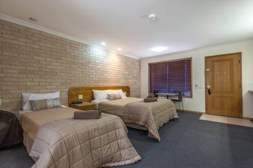 Imagen de la habitación del Hotel Clifford Gardens Motor Inn. Foto 5