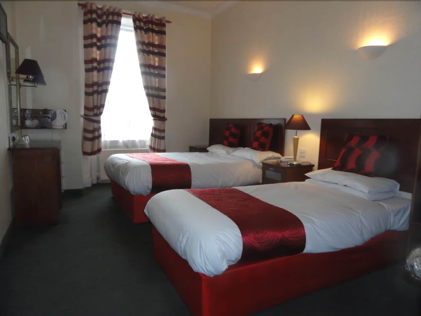 Imagen de la habitación del Hotel Clifton Court. Foto 13