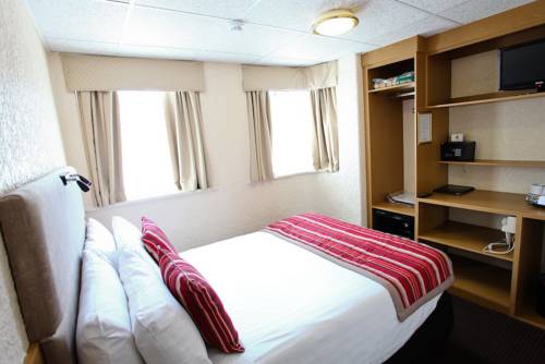 Imagen de la habitación del Hotel Clifton Court Metro. Foto 6