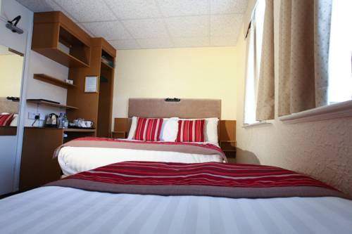 Imagen de la habitación del Hotel Clifton Court Metro. Foto 7