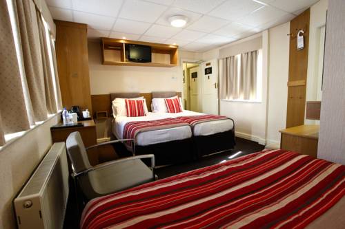 Imagen de la habitación del Hotel Clifton Court Metro. Foto 9