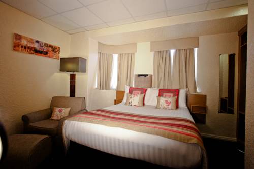 Imagen de la habitación del Hotel Clifton Court Metro. Foto 13