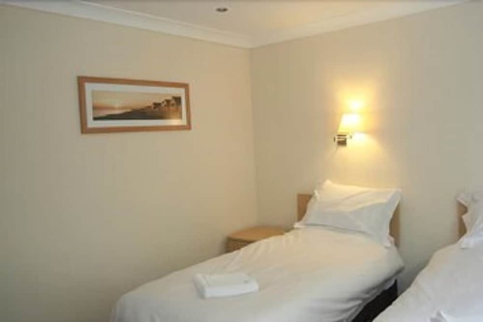 Imagen de la habitación del Hotel Clifton Lodge. Foto 7