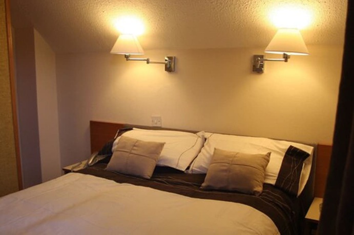Imagen de la habitación del Hotel Clifton Lodge. Foto 8